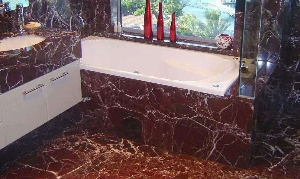 Red marble bathroom surfaces