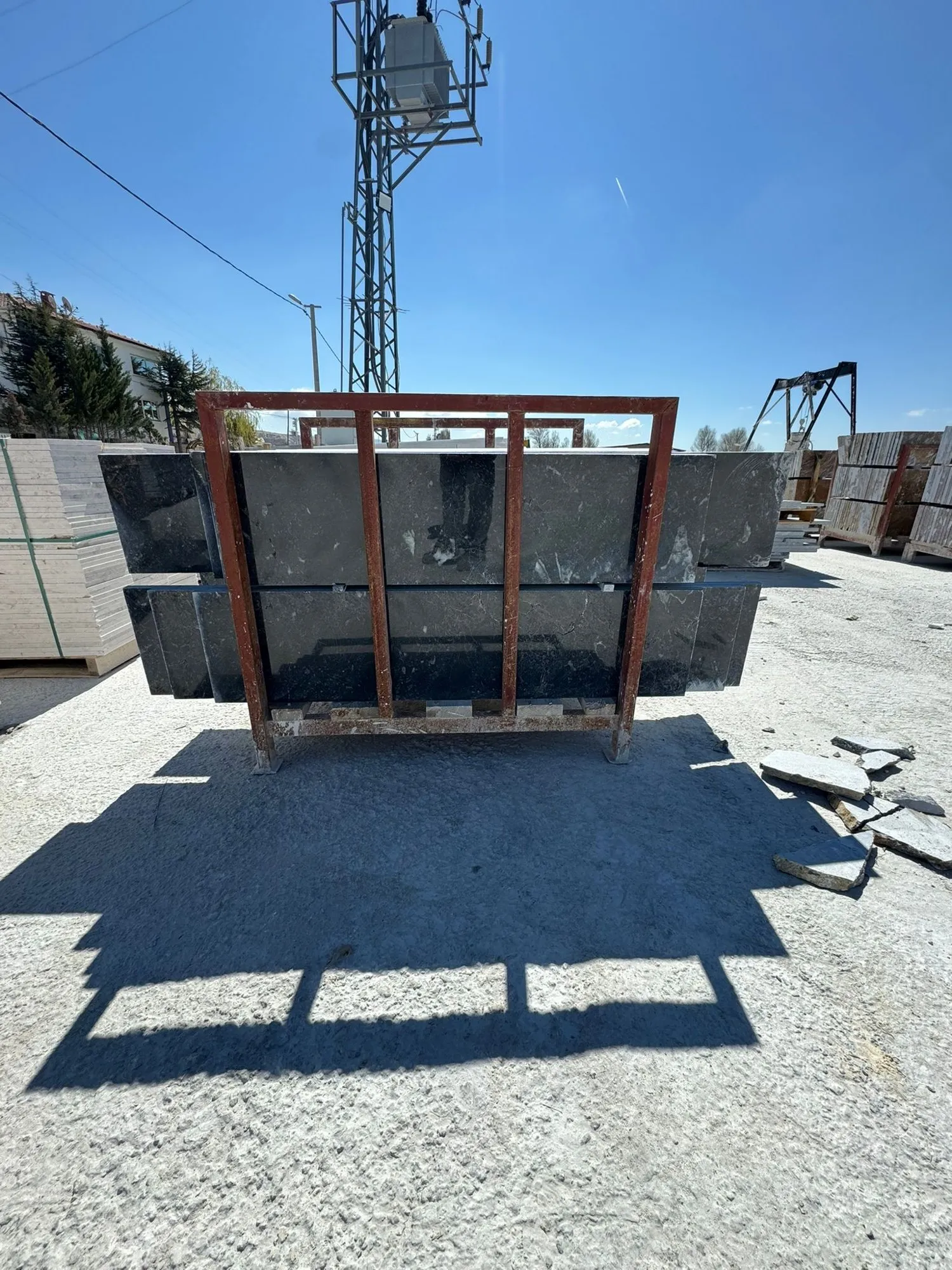 Black marble slabs on an A-frame rack