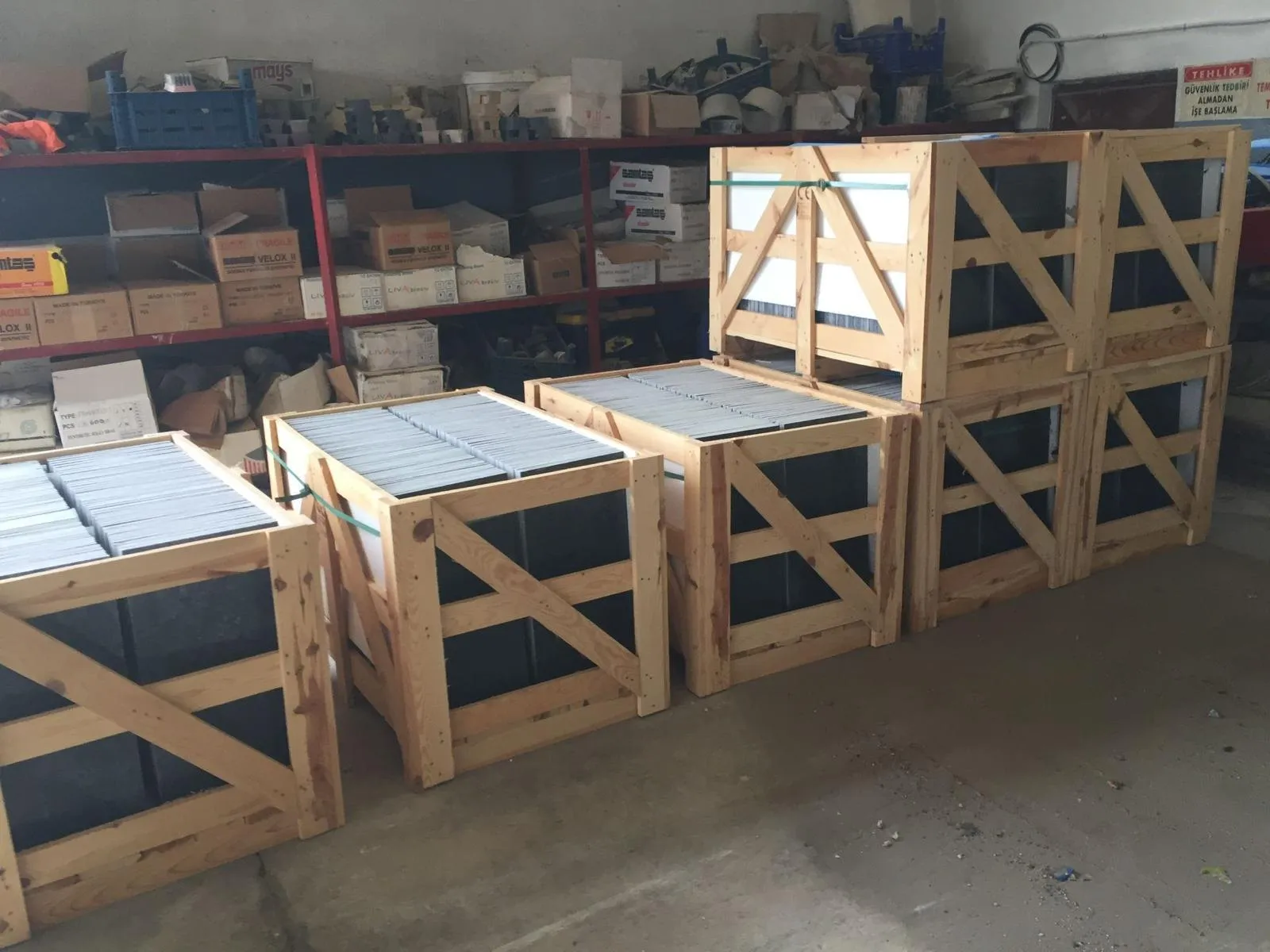 Marble tiles packed in wooden export crates ready for loading