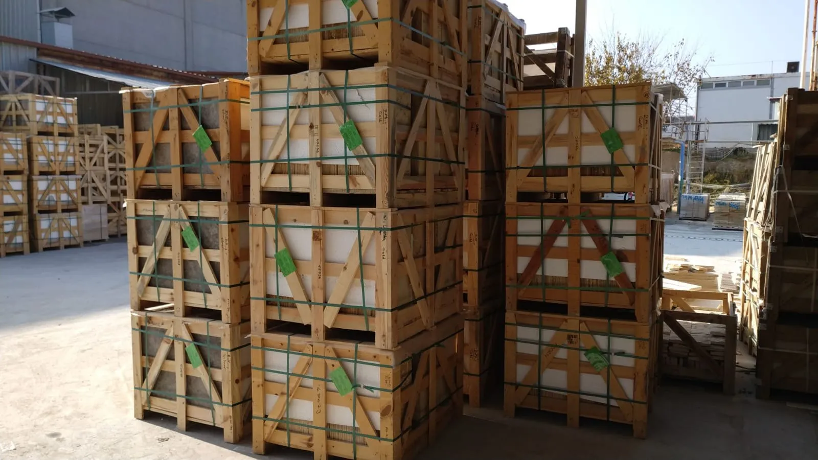 Travertine packed in wooden crates in the yard, ready for loading